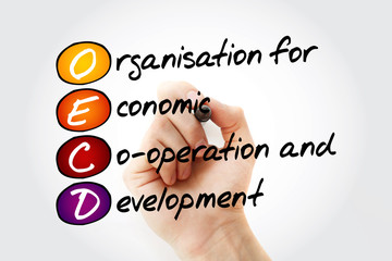 OECD - Organisation for Economic Co-operation and Development acronym with marker, business concept...