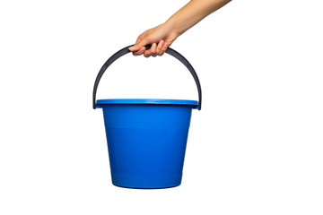 Plastic blue water bucket with black handle in hand. Cleaning Products and Supplies. Isolated white background © mantisphoto