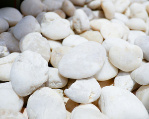 Fototapeta na wymiar White stone pebbles for background