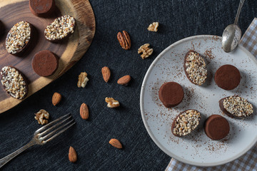 Homemade truffles from dark chocolate on a plate