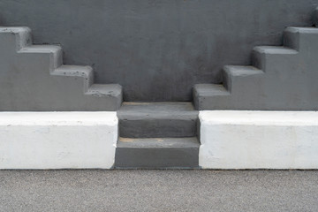 Selective view of the outdoor staircase with grey background. Minimalist concept.