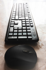black computer keyboard and mouse