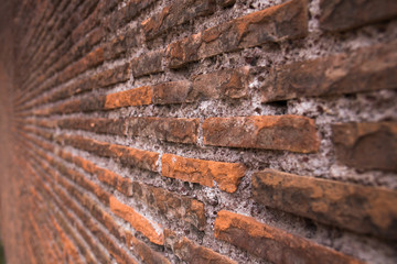 selective focus of textured brick wall with copy space