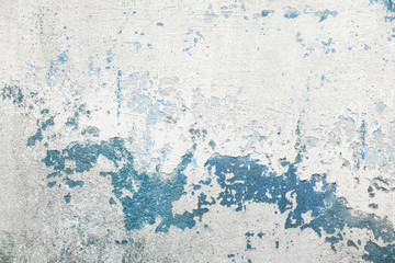 Abstract texture of old colorful wall with grain and scratches. Beautiful, artistic, creative background. White and blue rough weathered stone texture. Copy space