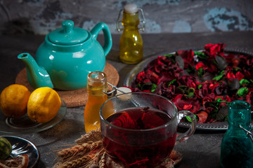 Red Hot Hibiscus tea in a glass mug