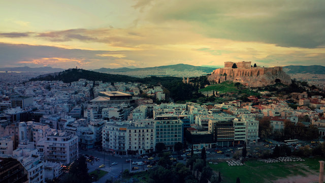 Aerial drone photo of iconic Acropolis hill and the Parthenon at dusk with beautiful sky and colours, Athens, Attica, Greece