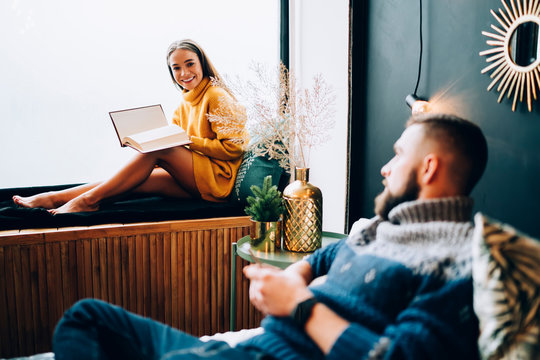 Cheerful Young Couple Bonding In Decorated Bedroom