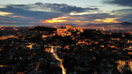Aerial drone night shot of iconic Acropolis hill and the Parthenon at dusk with beautiful sky colours, Athens, Attica, Greece
