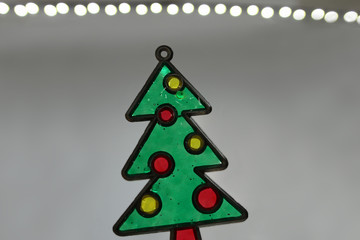 Crafted stained glass Christmas tree close up
