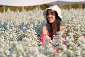 girl with bouquet of white flowers