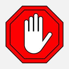 Obraz premium A red octagonal stop sign arm, STOP prohibits