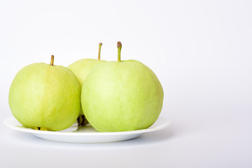 Fresh organic guava tropical fruit on white background. Healthy food high vitamin C concept
