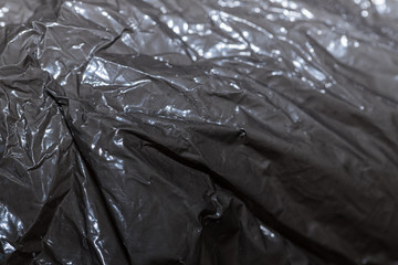black wrinkled foil, closeup, background