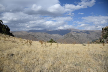mountain landscape with blue sky and clouds