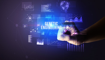 Hand touching GENETIC ENGINEERING inscription, new business technology concept