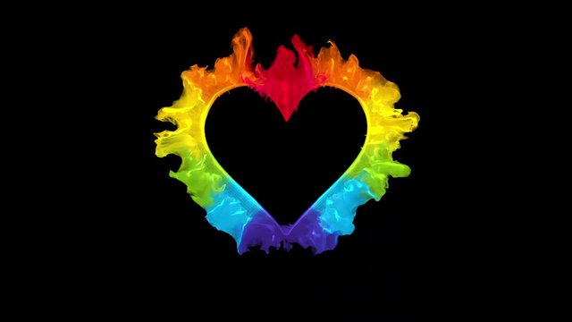 Iridescent multicolored heart shaped Valentine's Day particle burst. Vivid rainbow colored smoke shockwave. Romantic lovely logo and copy space animation. Isolated on black alpha copyspace 4k 60fps