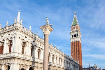 Fototapeta na wymiar Biblioteca Nazionale Marciana, Column of San Teodoro, the Clock Tower and St Marks Campanile, Piazza San marco, Venice, Veneto, Italy