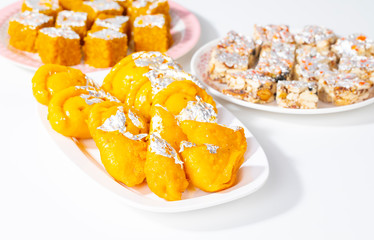 Indian Diwali Sweet Food Chandrakala with Sugar Free Dry Fruits, Mung Dal Chakki And Sweet Samosa