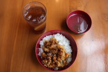 a bowl of delicious rice on the table.