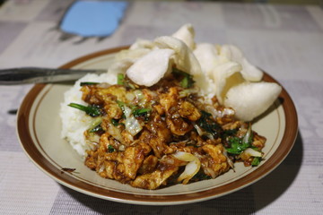 rice with delicious fried eggs on the table..