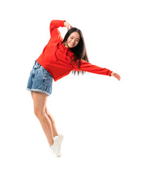 Young asian dancer over isolated white background