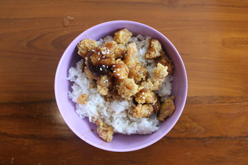 a bowl of delicious rice on the table.