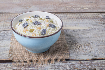 Сurd on a plate with raisin, honey, pumpkin seed. Healthy breakfast Cottage cheese