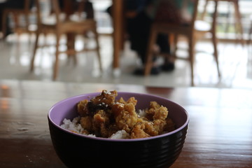 a bowl of delicious rice on the table.