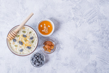 Сurd on a plate with raisin, honey, pumpkin seed. Healthy breakfast Cottage cheese