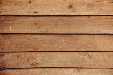 Naklejka premium The background of the old wooden planks used to make the walls reminds us of olden days when most houses were still built with wood.