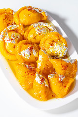 Indian Diwali Sweet Food Chandrakala with Sweet Samosa is Made with Maida for Outer Covering And Khoya, Nuts