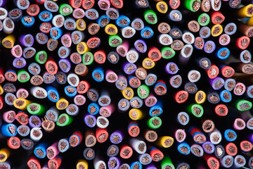 Cross section of electrical installation cable as background