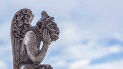 Gargoyle statue, chimeras on the Notre Dame de Paris