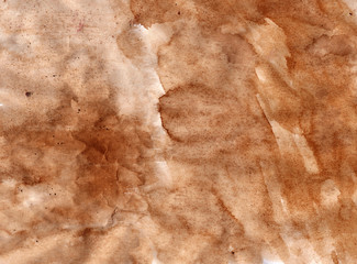 Coffee splashes paper background. Old shabby, aged and worn paper.
