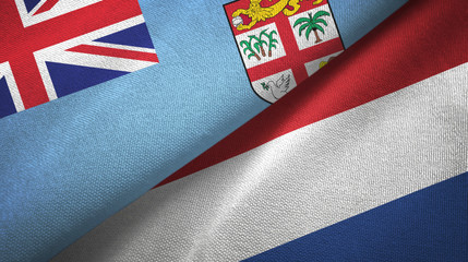 Fiji and Netherlands two flags textile cloth, fabric texture