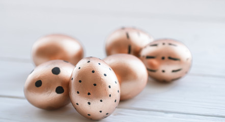 Beautiful decorated Easter eggs of Golden color .