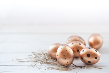 Beautiful decorated Easter eggs of Golden color .