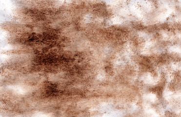 Paper stained with coffee. Old shabby, aged and worn paper.