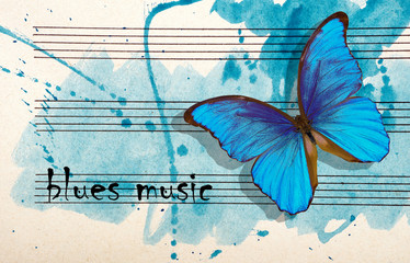 Obraz na płótnie Canvas Morpho blue butterfly and notes. Butterfly melody. Photo of old music sheet in blue watercolor paint. Blues music concept. Abstract blue watercolor background. copy spaces