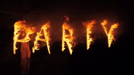 Burning Word PARTY at night