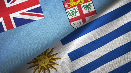 Fiji and Uruguay two flags textile cloth, fabric texture