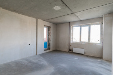 Russia, Omsk- August 05, 2019: interior room apartment. rough repair for self-finishing. interior decoration, bare walls of the room, stage of construction