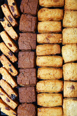 cakes baked in a pod. Coffee break breakfast at the hotel.Luxury hotel restaurant deserts open buffet. Table with deserts, Sweet desserts and pastries on the table .barley