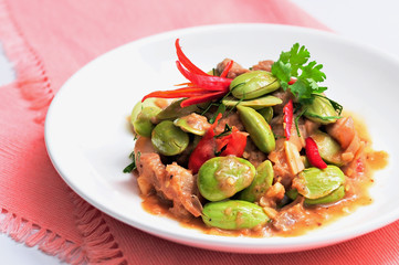 Deep fried pork with Bitter bean shrimp paste local delicious from southern Thailand.