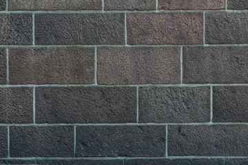 Texture of a stone wall. Old castle stone wall. Stone wall as a background or texture. Rock texture