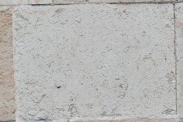 Texture of a stone wall. Old castle stone wall. Stone wall as a background or texture. Part of a stone wall, for background. Stones texture and background. Rock texture