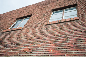Windows in a blank modern brick wall