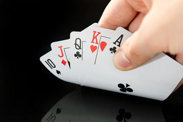 Man playing poker in casino