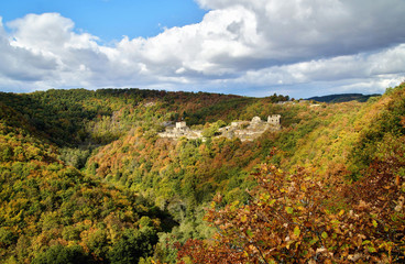 view of the celtic ruin Schmidtburg. Medieval Ruins of Schmidtburg, Hunsrueck, Germany german celtic landscape concept. Stone wall around place. Travel destination.