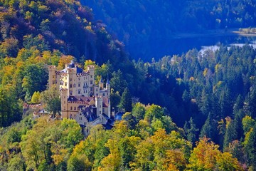 Fototapeta na wymiar Hohenschwangau Castle surrounded with Fall or Autumn forest, Castle in Schwangau, Germany